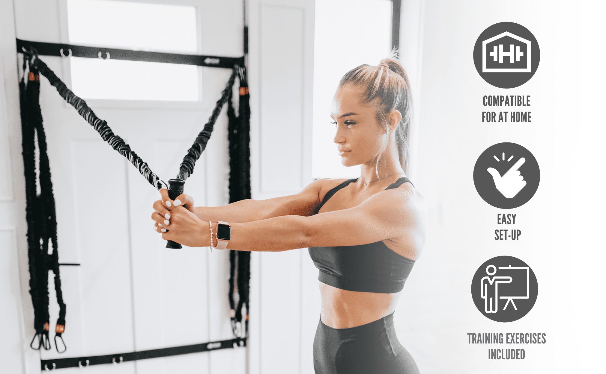 Female athlete doing chest fly with 4KOR Fitness resistance cords on door anchor, icons: Compatible For At Home, Easy Set-Up, Training Exercises